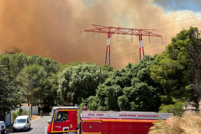 this-photo-provided-by-the-fire-brigade-sdis13-smoke-rises-during-a-wildfire-near-marseille-southern-france-tuesday-july-8-2025-sdis13-via-ap