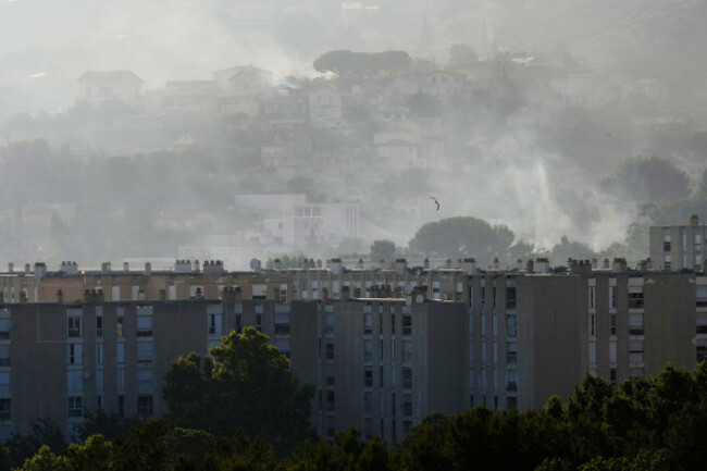 corrects-to-castellane-not-catellane-smoke-rises-behind-buildings-during-wildfire-tuesday-july-8-2025-in-la-castellane-district-of-marseille-southern-france-ap-photolewis-joly