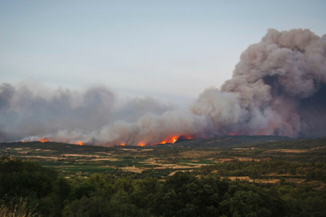 a-fast-moving-wildfire-in-a-mediterranean-region-of-france-near-the-spanish-border-is-pictured-tuesday-aug-5-2025-richard-capouladeugc-via-ap