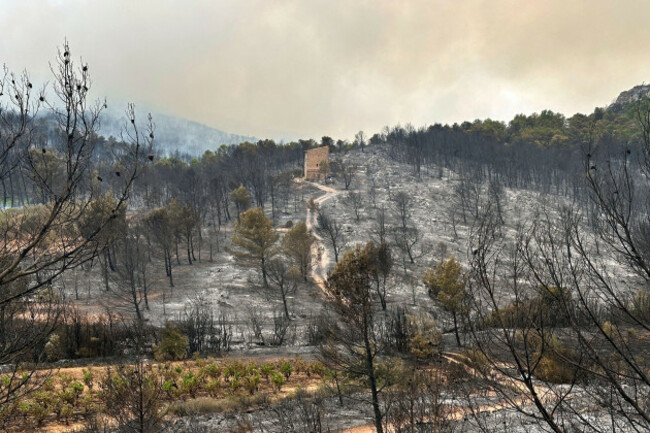 a-house-stands-in-the-middle-of-burned-trees-during-frances-biggest-wildfire-this-summer-near-durban-corbieres-southern-france-wednesday-aug-6-2025-ap-photohernan-munoz