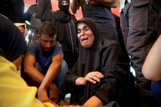 people-mourn-their-loss-as-bodies-of-palestinians-killed-in-israeli-attack-on-makeshift-tents-are-brought-to-al-nasser-hospital-people-mourn-their-loss-as-bodies-of-palestinians-killed-in-israeli-atta