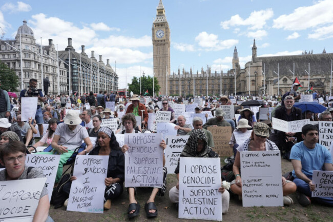 supporters-of-palestine-action-take-part-in-a-mass-action-in-parliament-square-westminster-central-london-organised-by-defend-our-juries-as-part-of-the-lift-the-ban-campaign-to-end-the-proscriptio