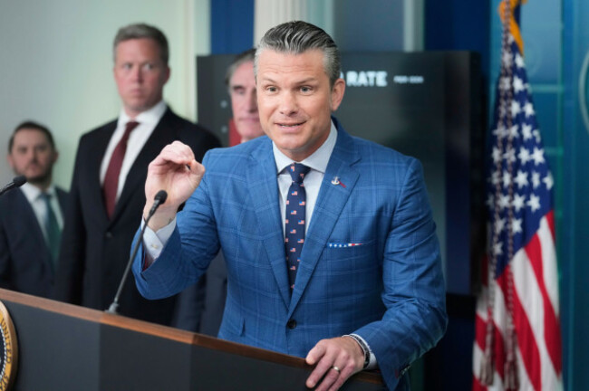 defense-secretary-pete-hegseth-from-right-speaks-as-interior-secretary-doug-burgum-and-army-secretary-dan-driscoll-listen-during-a-press-briefing-with-president-donald-trump-in-the-james-brady-press