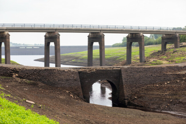 baitings-is-a-yorkshire-water-reservoir-in-calderdale-which-has-dried-to-a-point-where-an-ancient-packhorse-bridge-has-been-exposed-yorkshire-water-announced-that-a-hosepipe-ban-will-come-into-for