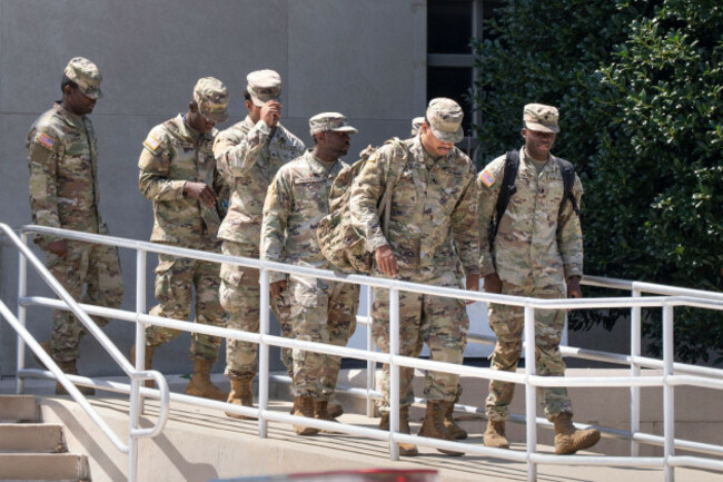 military-personnel-depart-the-district-of-columbia-national-guard-headquarters-as-president-donald-trump-implements-his-order-to-use-federal-law-enforcement-and-the-national-guard-to-expel-homeless-pe