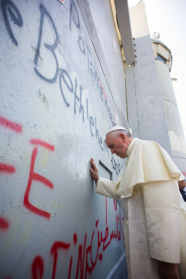 pope-francis-made-a-surprise-stop-at-the-wall-palestinians-abhor-as-a-symbol-of-israeli-oppression-in-bethlehem-israel-on-may-25-2014-in-an-image-likely-to-become-the-most-emblematic-of-his-trip-to