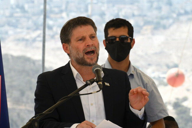 israeli-far-right-finance-minister-bezalel-smotrich-speaks-at-a-press-conference-near-maale-adumim-settlement-announcing-his-plan-to-approve-more-than-3000-jewish-housing-units-schools-health-fac