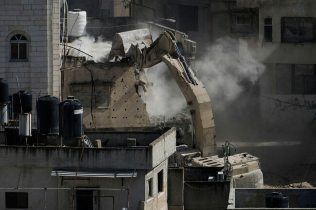 an-israeli-army-bulldozer-demolishes-homes-in-the-palestinian-urban-refugee-camp-of-nur-shams-in-the-west-bank-tuesday-may-6-2025-ap-photomajdi-mohammed