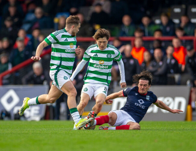 dingwall-uk-6th-oct-2024-6th-october-2024-victoria-park-dingwall-scotland-scottish-premiership-football-ross-county-versus-celtic-james-brown-of-ross-county-slide-tackles-kyogo-furuhashi-of-c