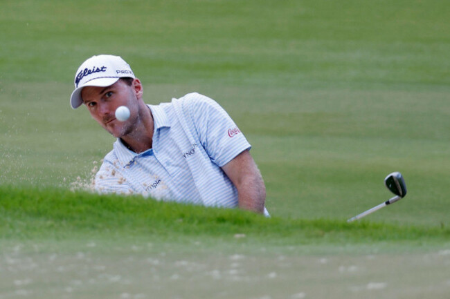 atlanta-ga-august-21-russell-henley-of-the-united-states-watches-his-shot-from-the-bunker-on-no-18-during-the-first-round-of-the-pga-tour-championship-august-21-2025-at-east-lake-golf-club-in-a