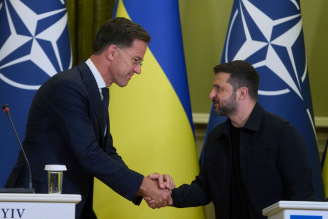 nato-secretary-general-mark-rutte-left-shakes-hands-with-ukrainian-president-volodymyr-zelenskyy-during-their-briefing-in-kyiv-ukraine-friday-aug-22-2025-ap-photoefrem-lukatsky