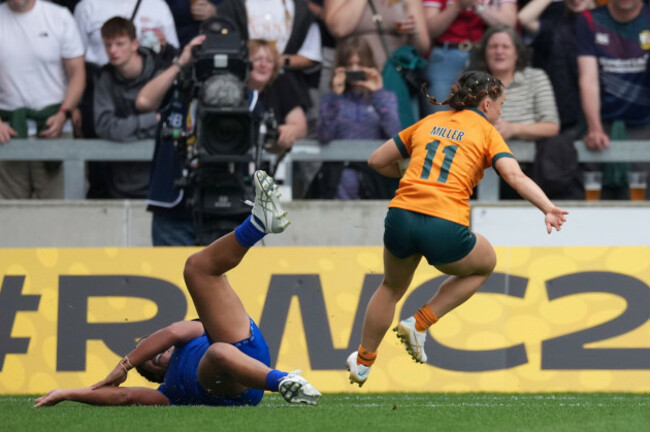 desiree-miller-of-australia-evades-a-tackle-during-the-group-a-match-at-the-2025-womens-rugby-world-cup-between-australia-and-samoa-in-manchester-england-saturday-aug-23-2025-ap-photodave-sho