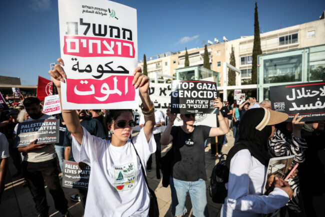 august-23-2025-tel-aviv-tel-aviv-israel-arab-israeli-and-israeli-left-wing-activists-hold-placards-and-photos-of-malnurished-children-during-a-protest-at-habima-square-in-tel-aviv-against-the-on