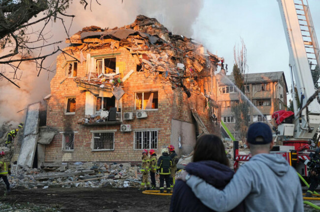 firefighters-work-at-the-site-of-a-burning-building-after-a-russian-attack-in-kyiv-ukraine-early-thursday-aug-28-2025-ap-photoefrem-lukatsky