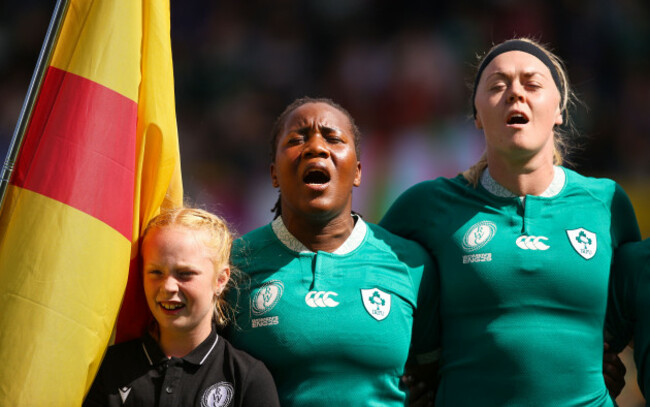 linda-djougang-and-sam-monaghan-during-the-nation-anthem