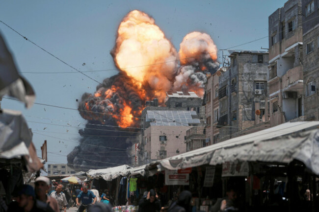 thick-smoke-and-flames-erupt-from-an-israeli-airstrike-in-gaza-city-sunday-june-1-2025-ap-photojehad-alshrafi