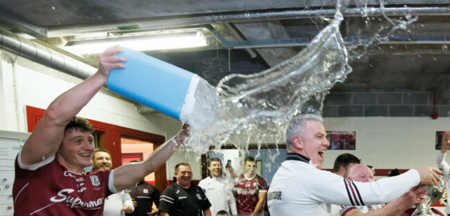 kieran-molloy-throws-water-on-manager-padraic-joyce-as-they-celebrate-after-the-game