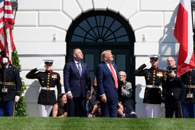president-donald-trump-right-and-polish-president-karol-nawrocki-left-watch-a-military-aircraft-flyover-at-the-white-house-wednesday-sept-3-2025-in-washington-ap-photoalex-brandon