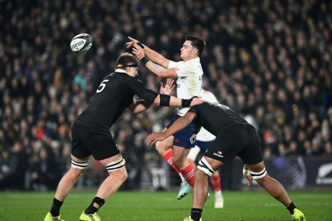 frances-nolann-le-garrec-right-passes-the-ball-over-new-zealands-fabian-holland-during-their-rugby-union-test-match-in-hamilton-new-zealand-on-saturday-july-19-2025-jeremy-wardphotosport-via