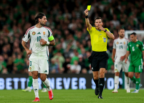 dominik-szoboszlai-is-shown-a-yellow-card-by-harm-osmers