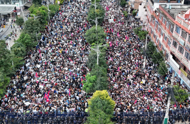 kathmandu-nepal-8th-sep-2025-young-gen-z-protesters-clash-with-police-after-breaking-barricades-outside-the-federal-parliament-in-kathmandu-nepal-on-monday-september-8-2025-demonstrators-rall