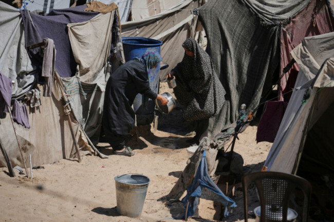 displaced-palestinians-wash-their-dishes-at-a-tent-camp-in-muwasi-an-area-that-israel-has-designated-as-a-safe-zone-in-khan-younis-southern-gaza-strip-wednesday-sept-10-2025-ap-photojehad-als