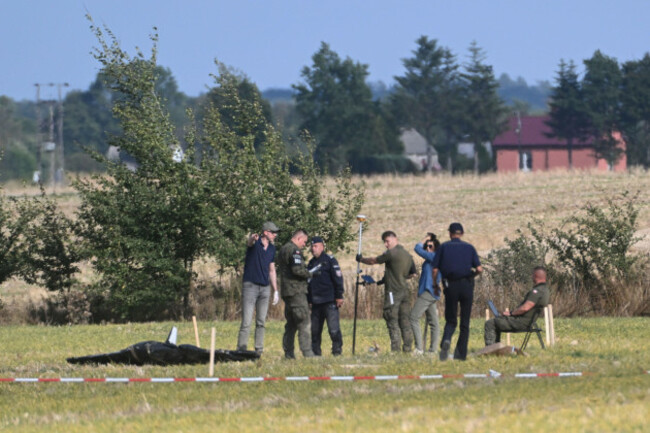 police-and-military-police-secure-parts-of-a-damaged-uav-shot-down-by-polish-authorities-at-a-site-in-wohyn-poland-wednesday-sept-10-2025-ap-photo