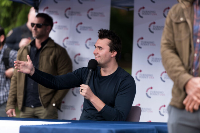 seattle-usa-7th-may-2024-charlie-kirk-the-controversial-founder-and-executive-director-of-turning-point-usa-holds-a-debate-at-1230pm-prior-to-a-630pm-scheduled-event-outside-at-the-hub-concern-r