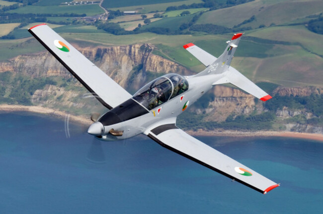 a-second-image-of-the-irish-air-corps-pilatus-pc-9-in-flight-showcasing-the-aircrafts-agility-and-versatility-during-a-high-speed-formation-maneuver-the-aircraft-is-used-primarily-for-pilot-trainin