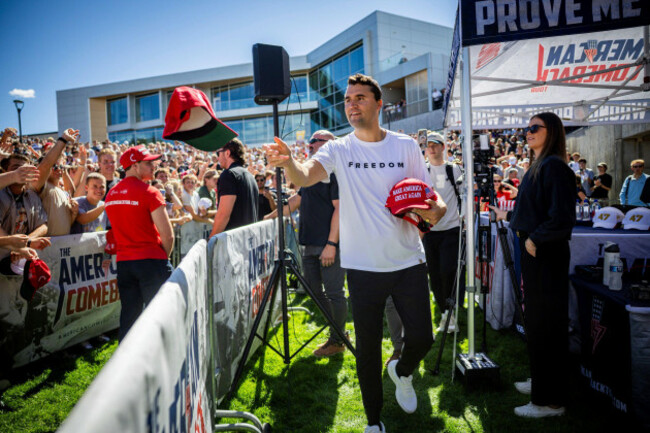 charlie-kirk-hands-out-hats-before-speaking-at-utah-valley-university-in-orem-utah-wednesday-sept-10-2025-tess-crowleythe-deseret-news-via-ap