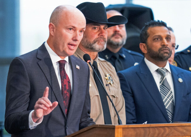 orem-united-states-12th-sep-2025-utah-governor-spencer-cox-l-stands-with-fbi-director-kash-patel-r-as-he-speaks-about-the-killing-of-conservative-activist-charlie-kirk-on-the-campus-of-utah-va