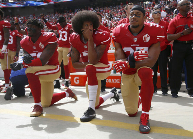 october-2-2016-santa-clara-ca-usa-from-left-the-san-francisco-49ers-eli-harold-58-colin-kaepernick-7-and-eric-reid-35-kneel-during-the-national-anthem-before-their-a-game-against-the-d