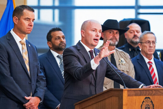 orem-united-states-12th-sep-2025-utah-governor-spencer-cox-c-stands-with-law-enforcement-officials-at-a-press-conference-about-the-killing-of-conservative-activist-charlie-kirk-on-the-campus-of