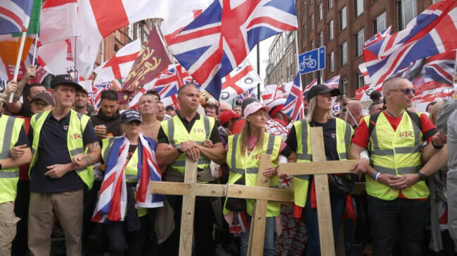 people-taking-part-in-a-tommy-robinson-led-unite-the-kingdom-march-and-rally-in-central-london-picture-date-saturday-september-13-2025