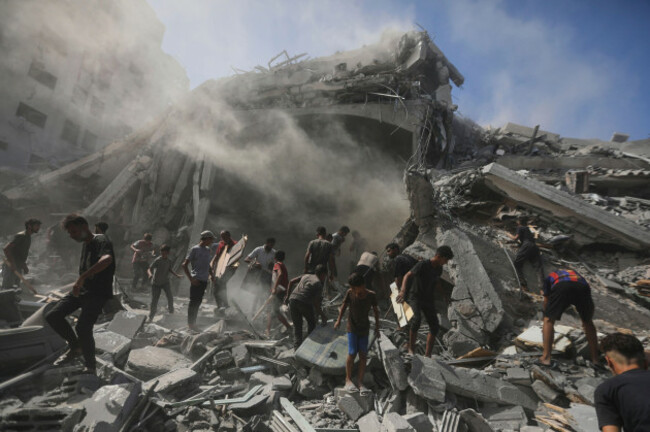 palestinians-search-for-wood-to-sell-or-use-for-cooking-amid-the-rubble-of-a-building-hit-by-an-israeli-strike-in-gaza-city-sunday-sept-14-2025-ap-photoyousef-al-zanoun