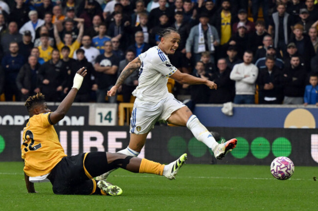leeds-uniteds-noah-okafor-right-scores-their-sides-third-goal-of-the-game-during-the-premier-league-match-at-molineux-stadium-wolverhampton-picture-date-saturday-september-20-2025