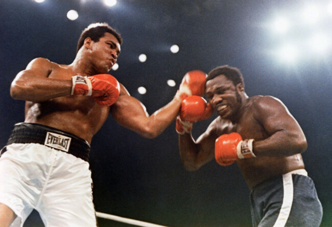 challenger-joe-frazier-and-champ-muhammad-ali-are-shown-in-their-title-bout-at-the-coliseum-oct-1-1975-in-manila-philippines-ap-photo