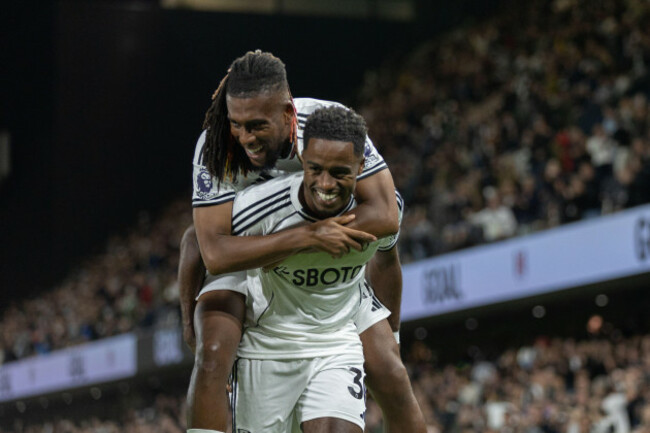 london-uk-20th-sep-2025-alex-iwobi-of-fulham-jumps-on-ryan-sessegnon-of-fulham-back-in-celebration-during-the-premier-league-match-between-fulham-and-brentford-at-craven-cottage-on-september-20-2