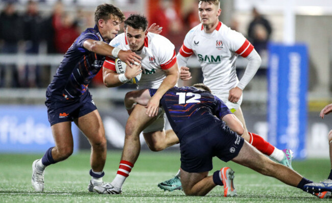 james-hume-is-tackled-by-findlay-thomson-and-ross-thompson