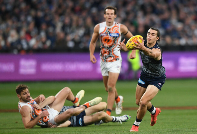 geelong-australia-27th-may-2023-oisin-mullin-of-the-cats-right-is-seen-in-action-during-the-afl-round-11-match-between-the-geelong-cats-and-the-gws-giants-at-gmhba-stadium-in-geelong-saturday