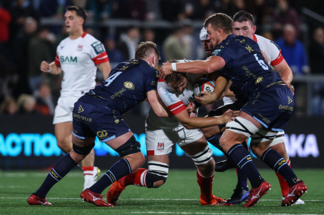 iain-henderson-is-tackled-by-matthew-screech-and-shane-lewis-hughes