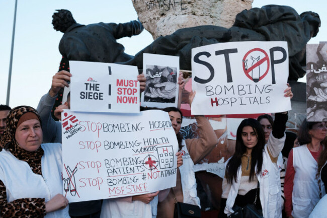 members-of-medecins-sans-frontieres-msf-also-known-as-doctors-without-borders-carry-placards-during-a-protest-to-demand-an-immediate-and-permanent-ceasefire-in-gaza-at-martyrs-square-in-beirut