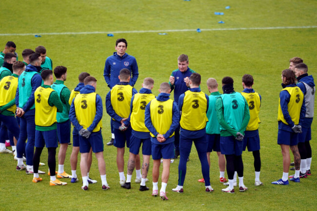 republic-of-ireland-manager-stephen-kenny-centre-right-and-assistant-keith-andrews-centre-left-speak-to-the-players-during-the-training-session-at-the-hive-stadium-london