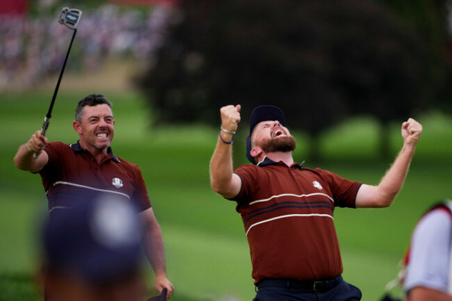 europes-shane-lowry-and-rory-mcilroy-react-after-their-match-win-on-the-18th-hole-at-bethpage-black-golf-course-during-the-ryder-cup-golf-tournament-saturday-sept-27-2025-in-farmingdale-n-y-a