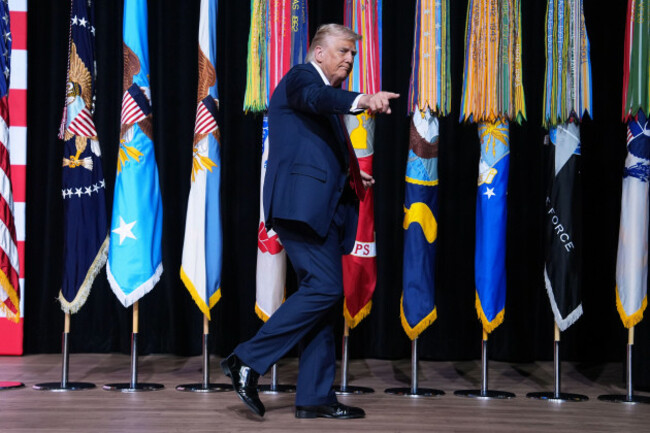 president-donald-trump-walks-off-after-speaking-to-a-gathering-of-top-u-s-military-commanders-at-marine-corps-base-quantico-tuesday-sept-30-2025-in-quantico-va-ap-photoevan-vucci