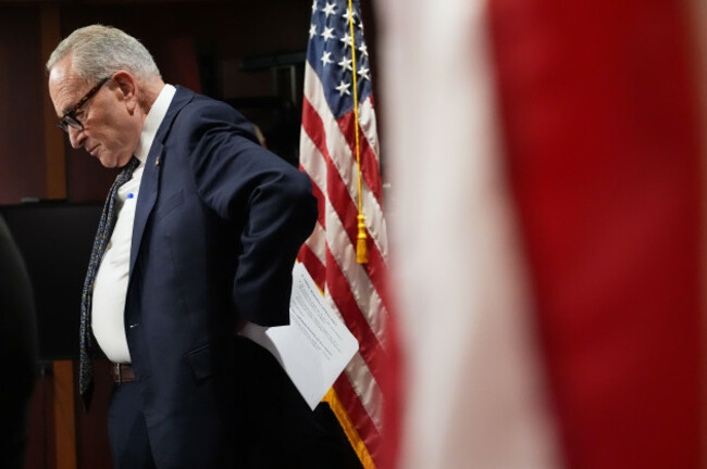 senate-minority-leader-chuck-schumer-of-n-y-listens-as-he-speaks-to-reporters-tuesday-sept-30-2025-at-the-u-s-capitol-in-washington-ap-photojacquelyn-martin