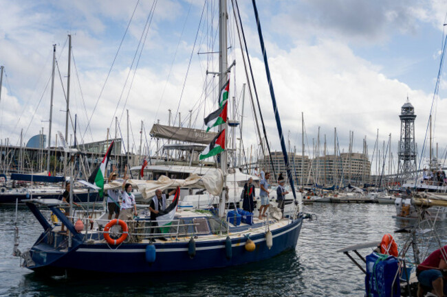 barcelona-spain-31082025-people-are-seen-on-a-boat-of-global-sumud-flotilla-from-the-port-of-barcelona-directed-to-gaza-in-an-attempt-to-deliver