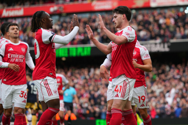 arsenals-declan-rice-centre-right-celebrates-with-teammates-after-scoring-the-opening-goal-during-the-substitution-at-the-english-premier-league-soccer-match-between-arsenal-and-west-ham-united-at