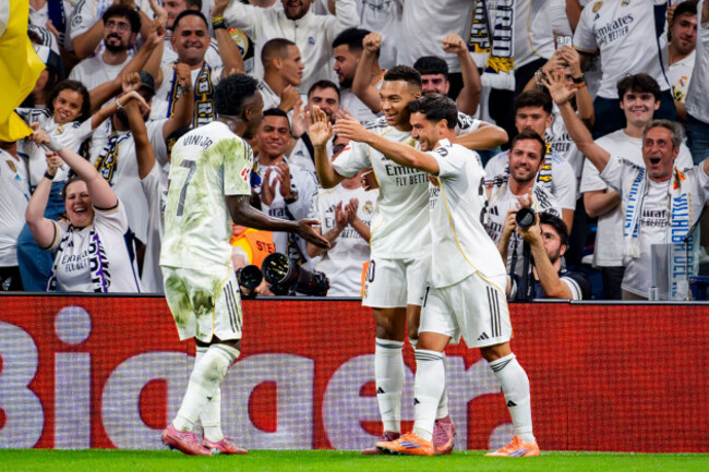 madrid-madrid-spain-4th-oct-2025-players-of-real-madrid-from-l-to-r-vinicius-junior-kylian-mbappe-brahim-diaz-celebrates-a-goal-during-the-laliga-ea-sports-football-match-between-real-madrid