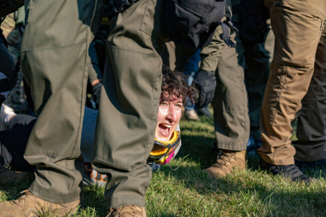 chicago-illinois-usa-3rd-oct-2025-a-protester-screams-in-pain-while-being-arrested-during-a-demonstration-outside-the-broadview-il-detainee-processing-facility-operated-by-ice-its-unclear-why
